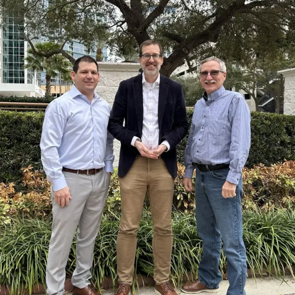Dr. Benjamin Schafer, center, with JP Cardin, left, and Dustin Cole, chair of the MBMA Technical Committee, at the 2026 MBMA Research Consortium. Photo credit: MBMA. | Dr. Benjamin Schafer Awarded MBMA’s 2026 Ellifritt Award