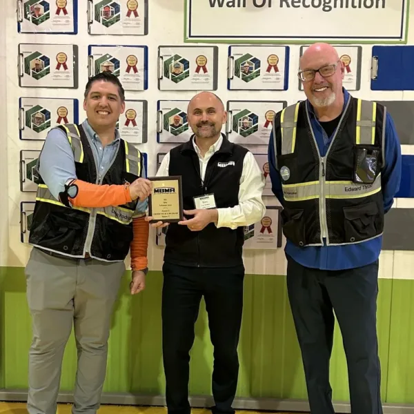 Tony Bouquot, MBMA General Manager (center), presents an MBMA Safety Award. | MBMA Announces 2025 Safety Award Winners