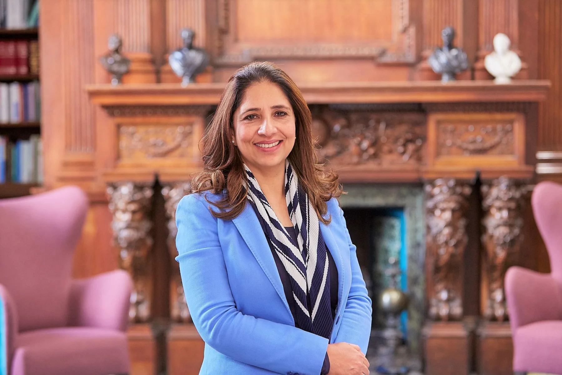 Person Rising From Chair UKWIR Welcomes Professor Anusha Shah as New Chair